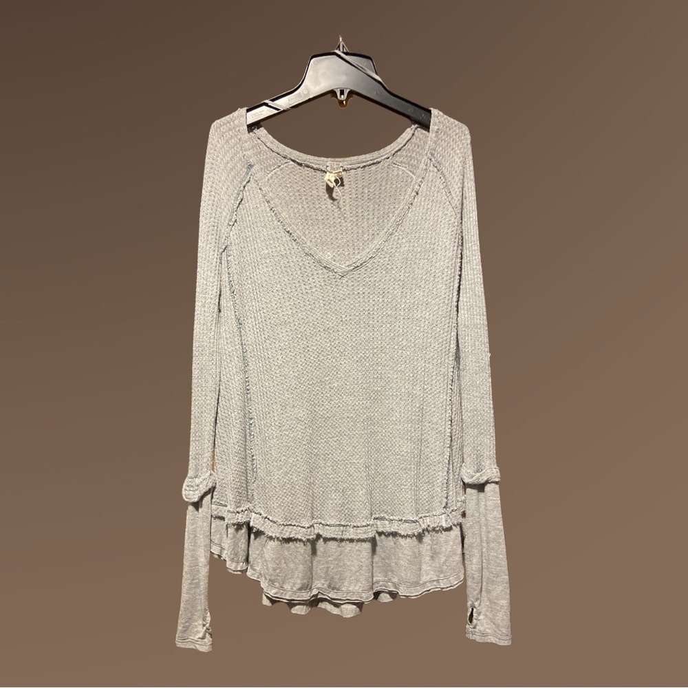 Free People Long sleeve top. Size is Xtra Small, Great Pre-Owned Condition.